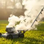 why is my push mower smoking white