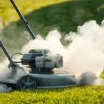 why is my lawn mower blowing white smoke